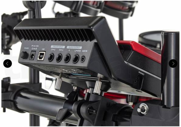 Módulo de batería Alesis Nitro Pro visto por la parte trasera, mostrando entradas, salidas y puertos de conexión para pads y accesorios.